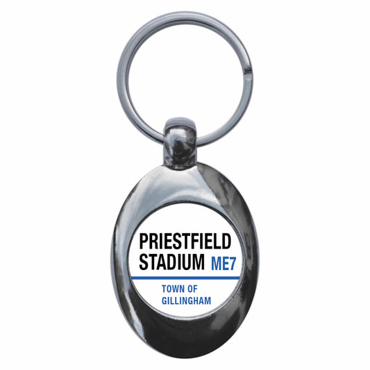 A picture of the front of the product, titled Priestfield Stadium ME7 Gillingham Road Sign Metal Keyring With Trolley Coin