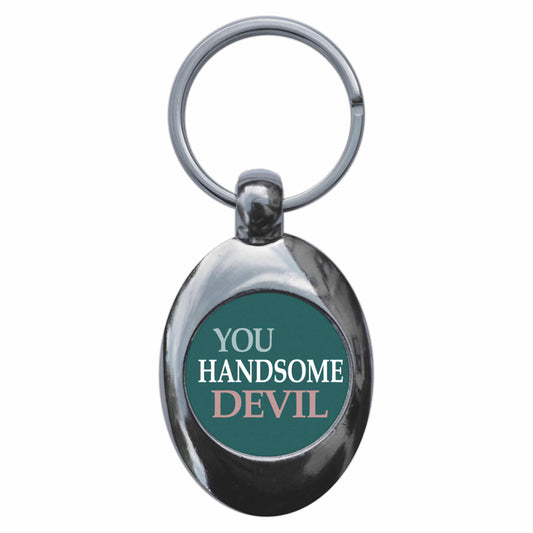 A picture of the front of the product, titled You Handsome Devil Metal Keyring With Trolley Coin