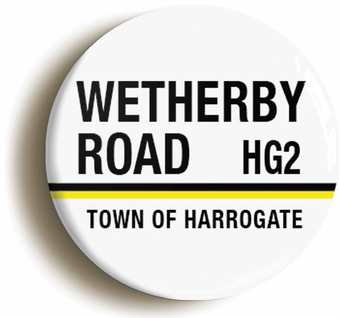 A picture of the front of the product, titled Wetherby Road HG2 Harrogate Road Sign Circular 50mm Fridge Magnet