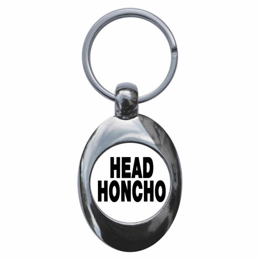 A picture of the front of the product, titled Head Honcho Metal Keyring With Trolley Coin