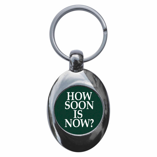 A picture of the front of the product, titled How Soon Is Now Metal Keyring With Trolley Coin