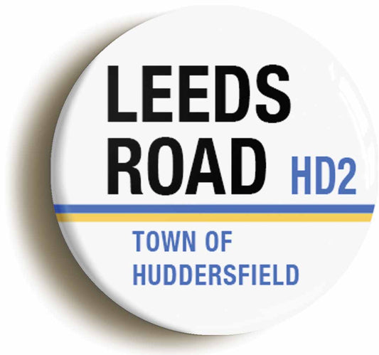 A picture of the front of the product, titled Leeds Road Town Of Huddersfield HD2 Road Sign Button Pin Badge