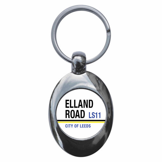A picture of the front of the product, titled Elland Road LS11 City Of Leeds Road Sign Metal Keyring With Trolley Coin