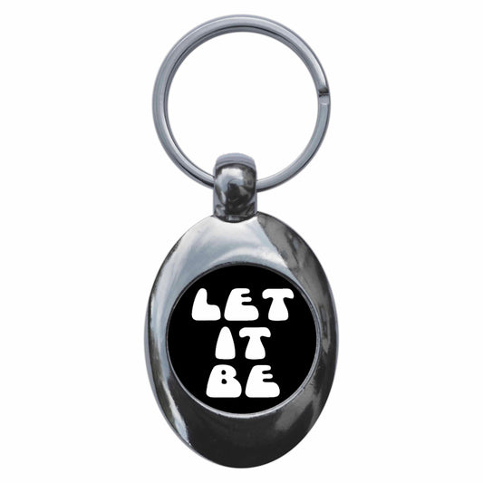 A picture of the front of the product, titled Let It Be Metal Keyring With Trolley Coin
