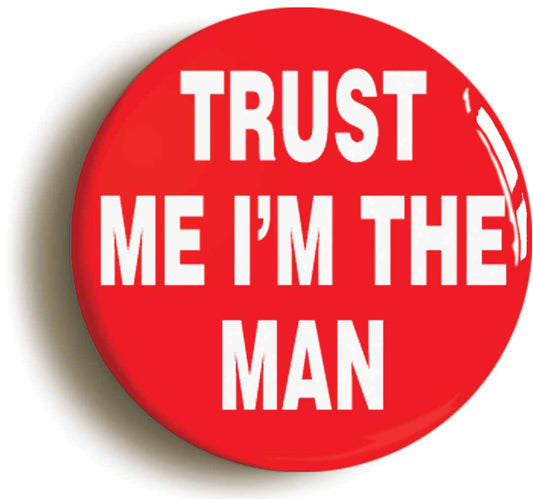 A picture of the front of the product, titled Trust Me I'm The Man Funny Button Pin Badge