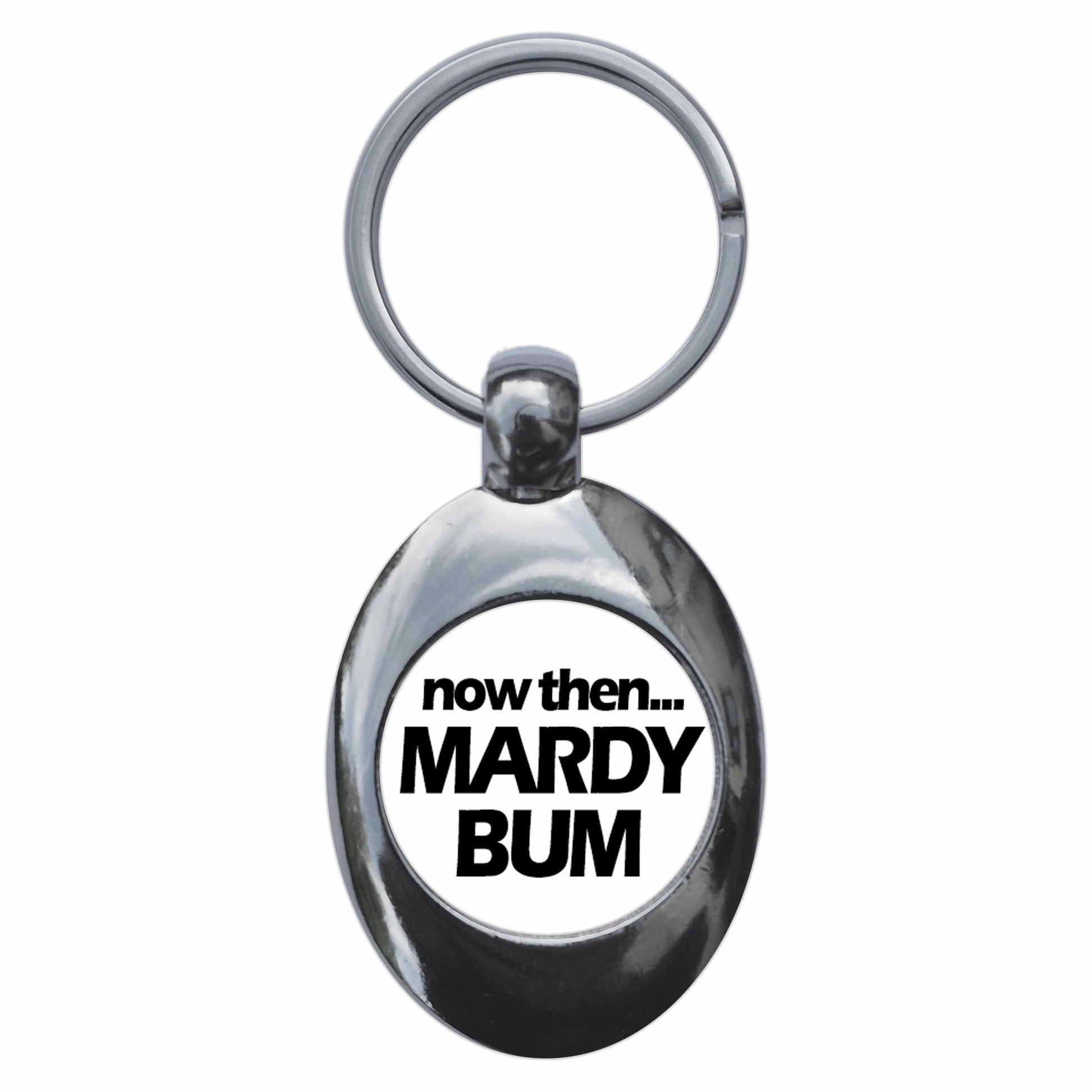 A picture of the front of the product, titled Now Then Mardy Bum Metal Keyring With Trolley Coin