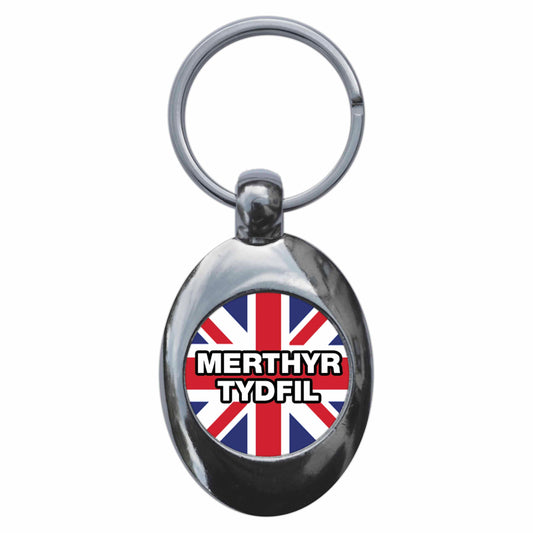 A picture of the front of the product, titled Merthyr Tydfil Union Jack Metal Keyring With Trolley Coin