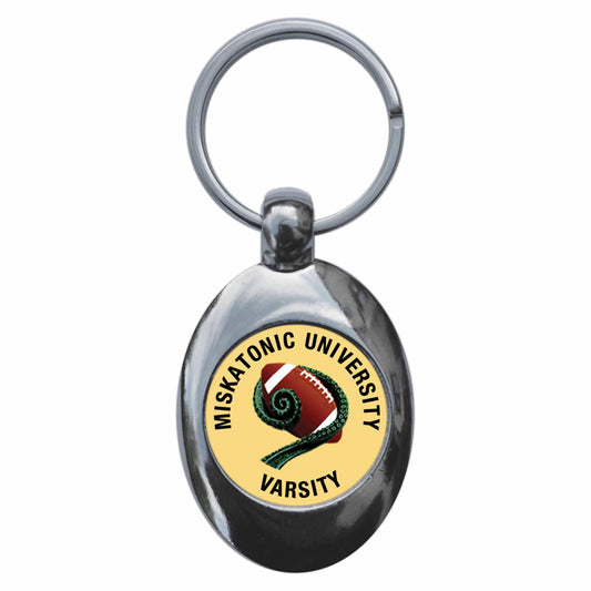 A picture of the front of the product, titled Miskatonic University Varsity Metal Keyring With Trolley Coin