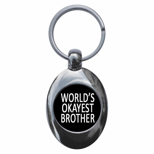 A picture of the front of the product, titled World's Okayest Brother Metal Keyring With Trolley Coin