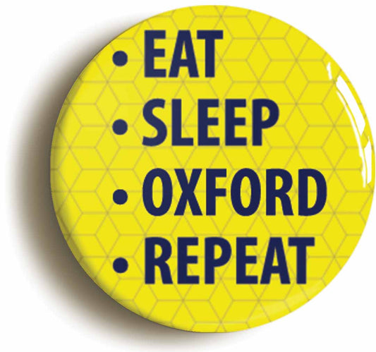 A picture of the front of the product, titled Eat Sleep Oxford Repeat Button Pin Badge