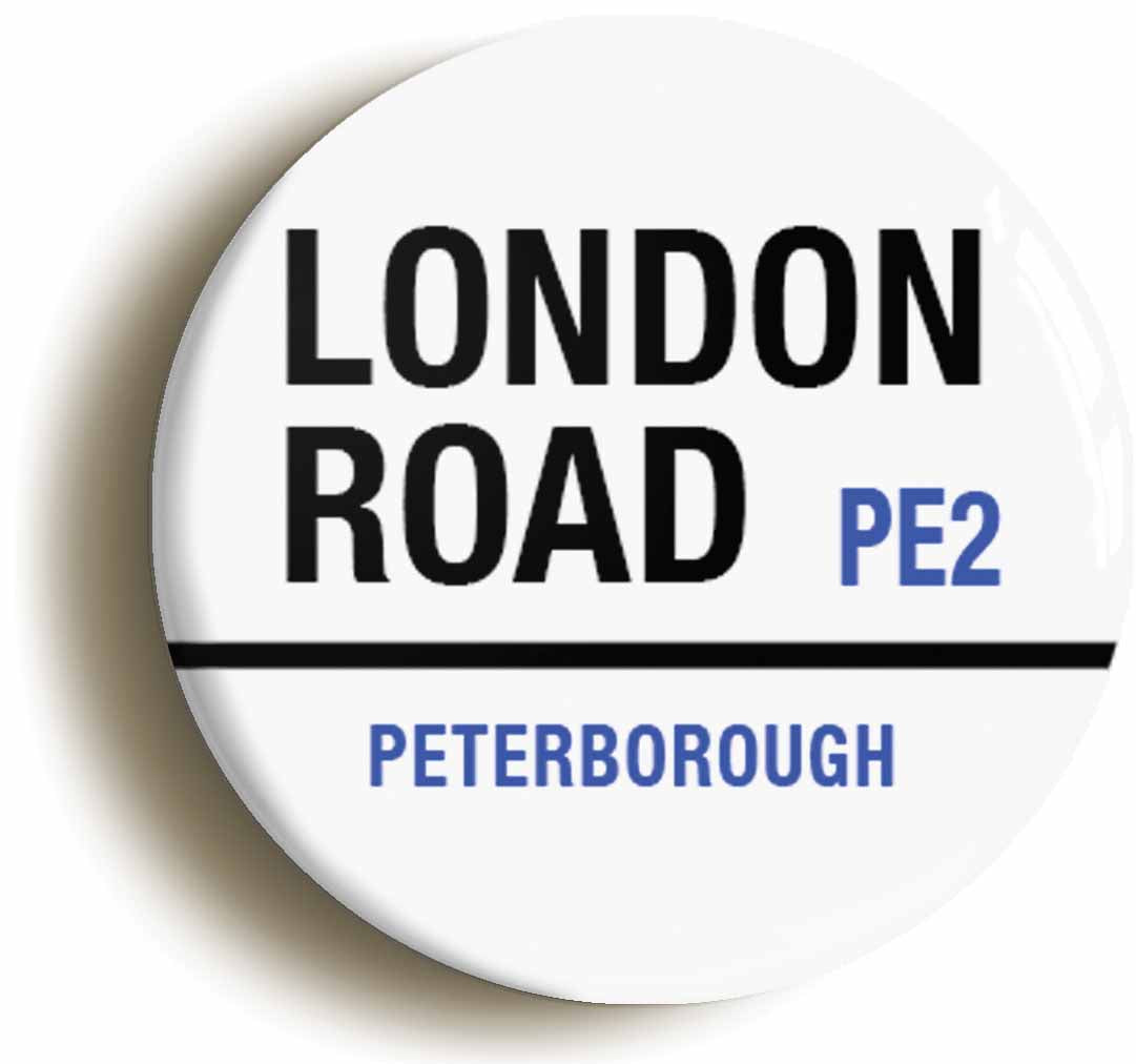 A picture of the front of the product, titled London Road PE23 Peterborough Road Sign Button Pin Badge