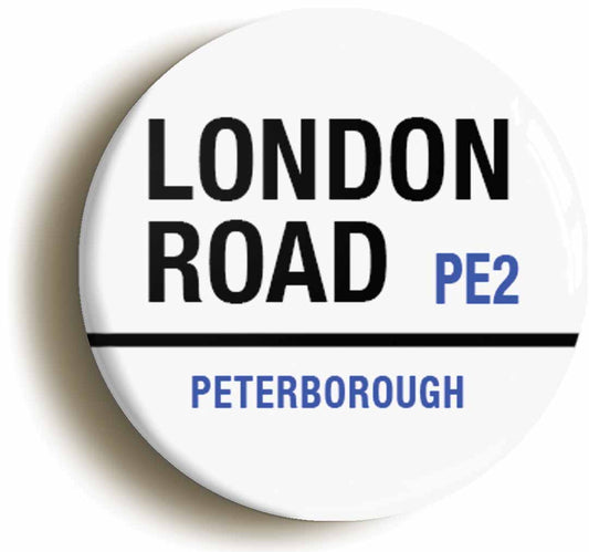 A picture of the front of the product, titled London Road PE23 Peterborough Road Sign Button Pin Badge
