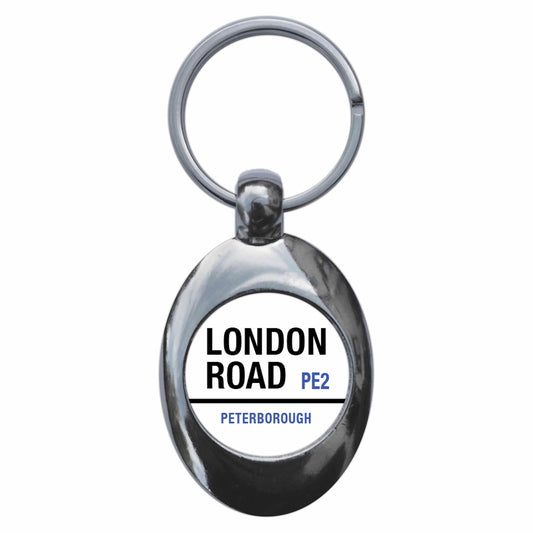 A picture of the front of the product, titled London Road PE23 Peterborough Road Sign Metal Keyring With Trolley Coin
