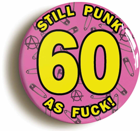 A picture of the front of the product, titled Still Punk As Fuck 60th Sixtieth Birthday Pink Button Pin Badge