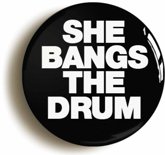 A picture of the front of the product, titled She Bangs The Drum Button Pin Badge