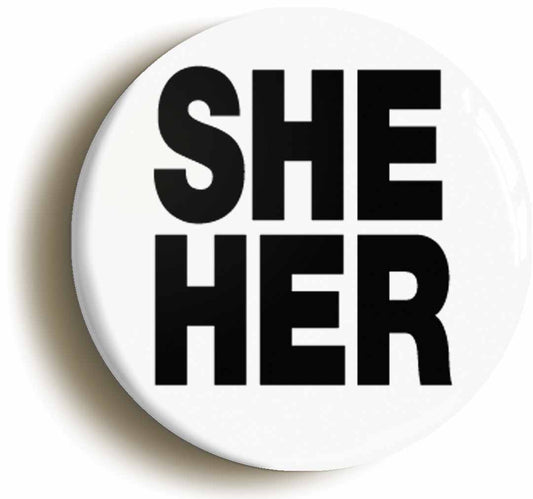 A picture of the front of the product, titled She Her Gender PronounsLGBTQ Diversity Button Pin Badge