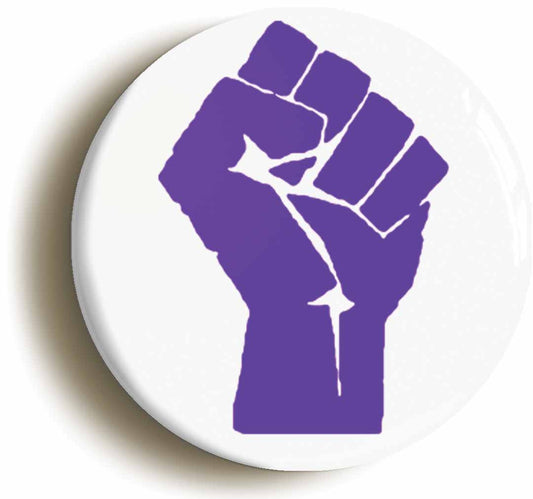 A picture of the front of the product, titled Solidarity Fist Symbo lPurple Button Pin Badge
