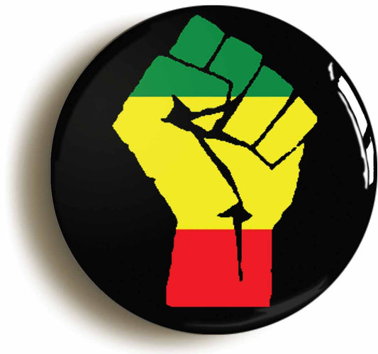 A picture of the front of the product, titled Rasta Reggae Solidarity Fist Symbol Button Pin Badge