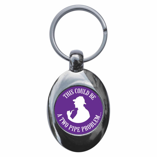 A picture of the front of the product, titled Sherlock Holmes This Could Be A Two Pipe Problem Metal Keyring With Trolley Coin