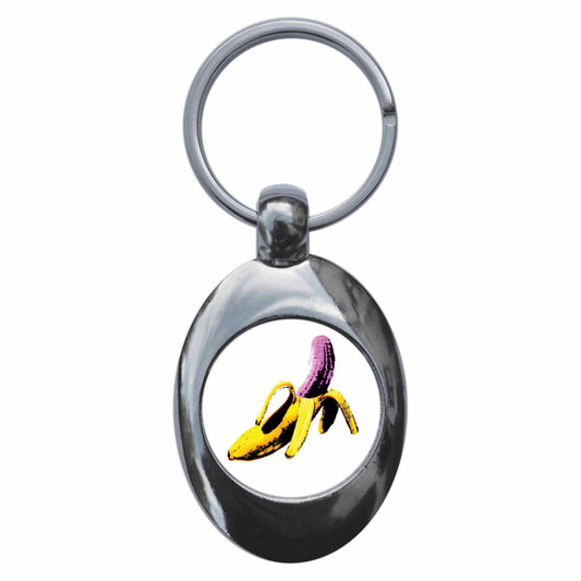 A picture of the front of the product, titled Pink Banana Sixties Pop Art Metal Keyring With Trolley Coin
