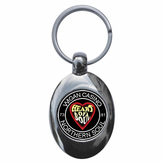 A picture of the front of the product, titled Northern Soul Wigan Casino Heart Of Soul Metal Keyring With Trolley Coin