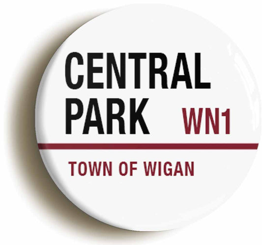 A picture of the front of the product, titled Central Park Town Of Wigan WN1 Road Sign Circular 50mm Fridge Magnet