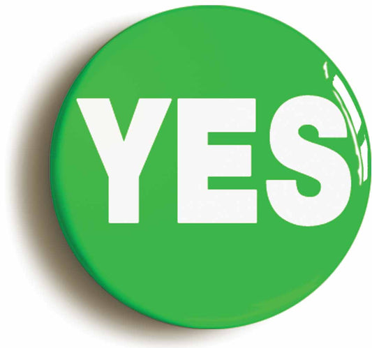 A picture of the front of the product, titled Yes Green Button Pin Badge
